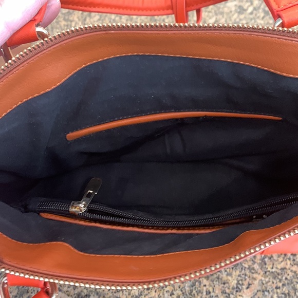 Orange handbag with a rust color body of bag and orange accent shoulder strap - Picture 10 of 16